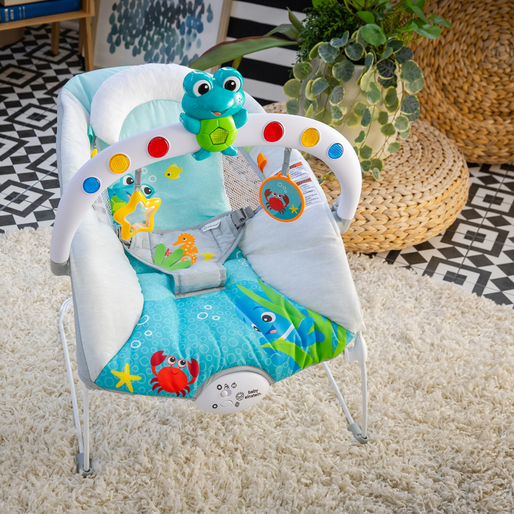 BABY EINSTEIN Lehátko hudobné vibračné so svetielkami Kick to It Neptune do 9 kg