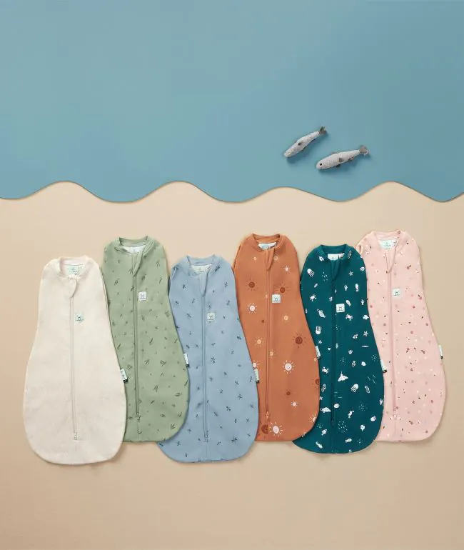 ERGOPOUCH Zavinovačka a vak na spanie 2v1 Cocoon Daisies 0-3 m, 3-6 kg, 0,2 tog