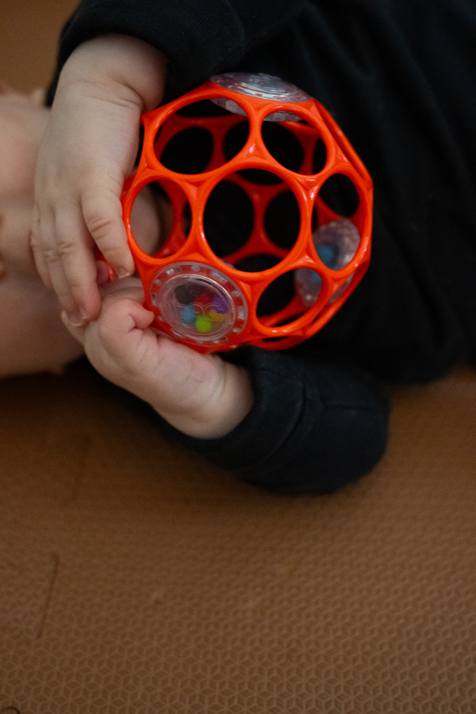 OBALL Hračka Oball RATTLE 10 cm orange 0m+