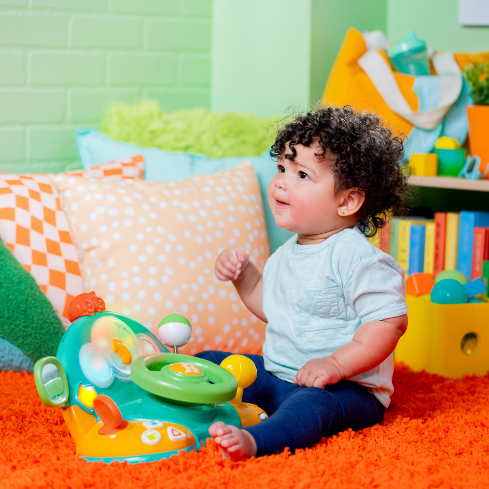 BRIGHT STARTS Hračka hudobná svetelná volant Lights&amp;Colors Driver™ 6m+