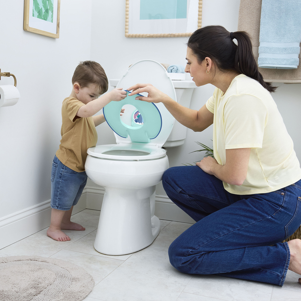 BRIGHT STARTS Redukcia na WC nalepovacia Flip &amp; Sit™ STITCH™ 18m+, do 23kg