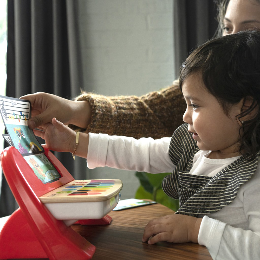 BABY EINSTEIN Hračka drevená hudobná klavír Cal’s First Melodies Magic Touch HAPE 6m+
