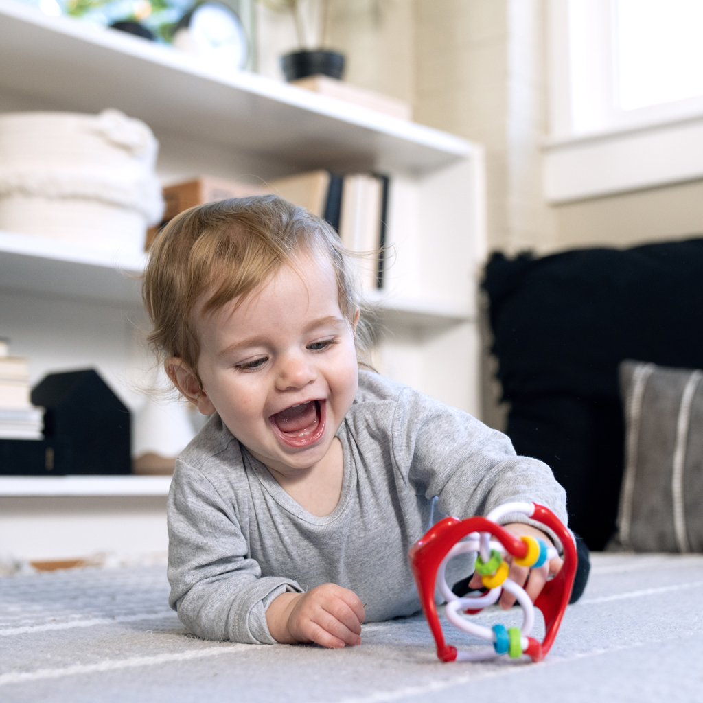 BABY EINSTEIN Hračka lopta senzorická Slide &amp; Swirl™ 3m+