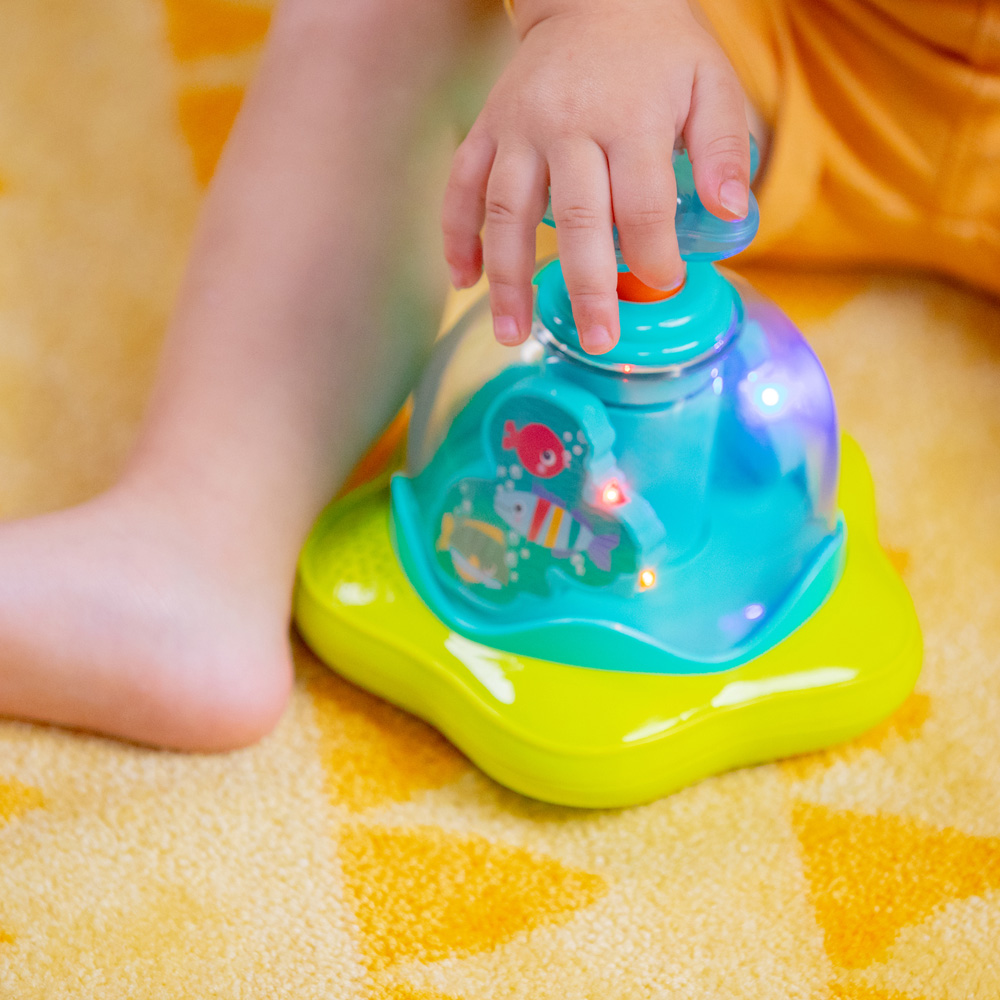 BRIGHT STARTS Hračka hudobná svietiaca Press&amp;Glow Spinner 6m+